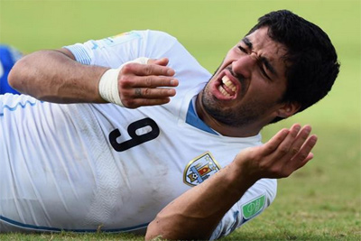 Luis Suárez suspended for nine matches and banned for four months from any football-related activity