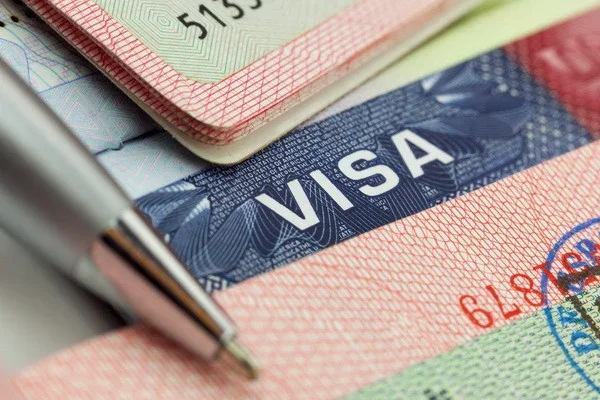 Compensation to be paid for obtaining a “work visa”