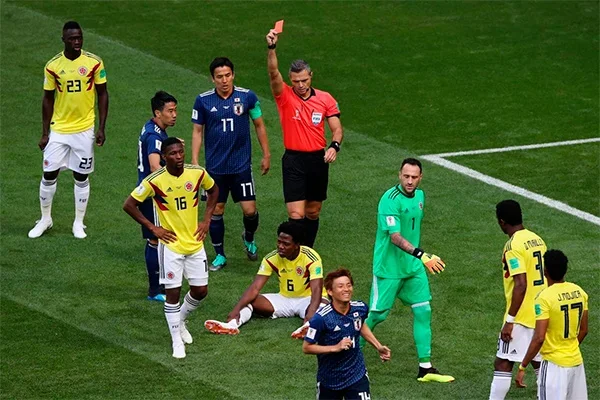 Japan upsets Colombia in Group H opener