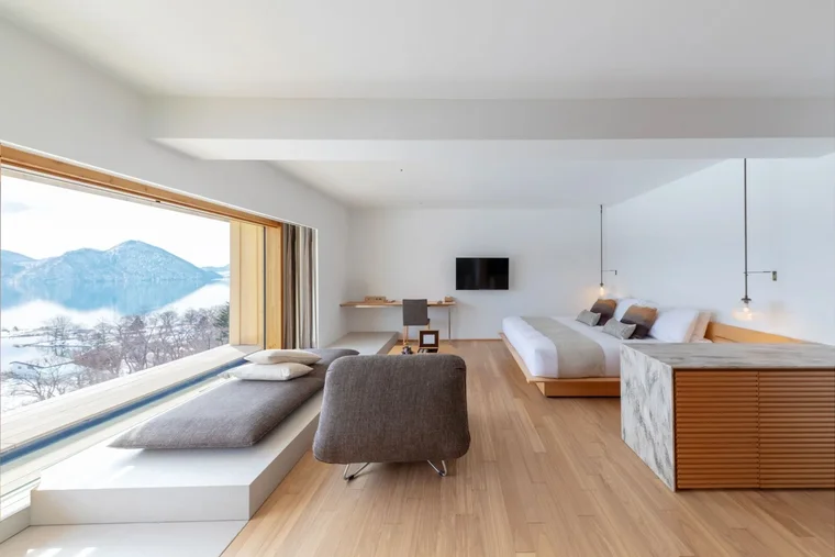 Dusit International brings its Dusit Collection  brand to Japan with the opening of a Kengo Kuma-designed lakeside retreat in Hokkaido