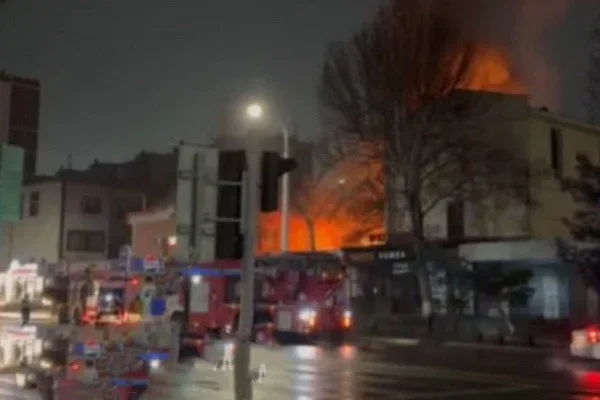 A fire breaks out in a cafe on Oshiyo Street at night