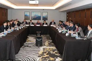 Representatives of the Central Election Commission of Uzbekistan takes part in the round table in Bishkek