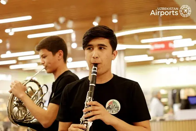 Surprise musical flashmob by music.glier boyband delights travelers at Tashkent Airport