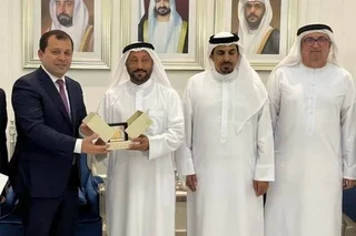 A meeting takes place with the Chairman of the Sharjah Chamber of Commerce and Industry