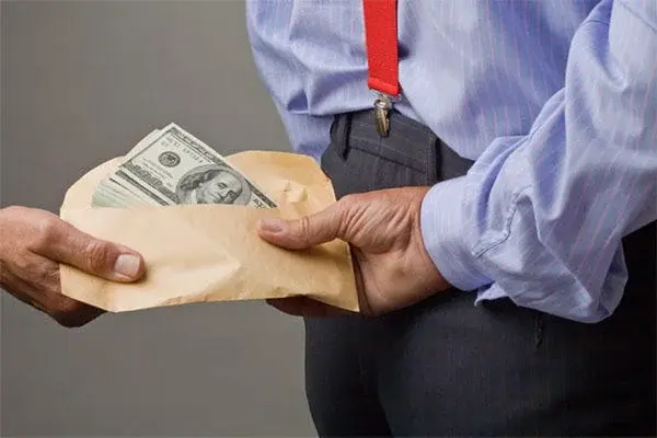 Person detained for attempting to bribe a police officer