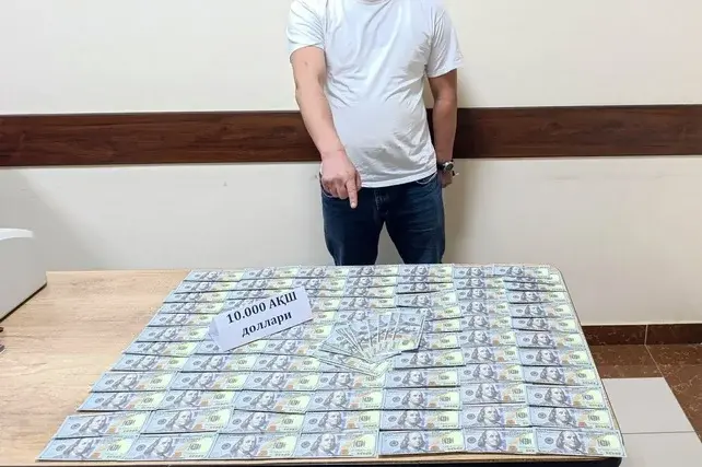 Қибрай тумани ҳокимининг ёрдамчиси 10 минг АҚШ доллари билан ушланди