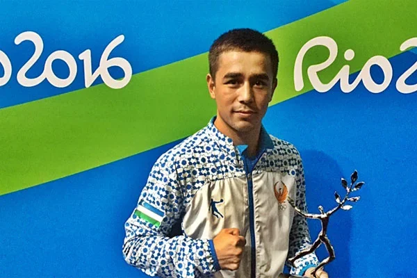 Hasanboy Dusmatov wins the Val Barker Trophy for the outstanding male boxer of Rio 2016
